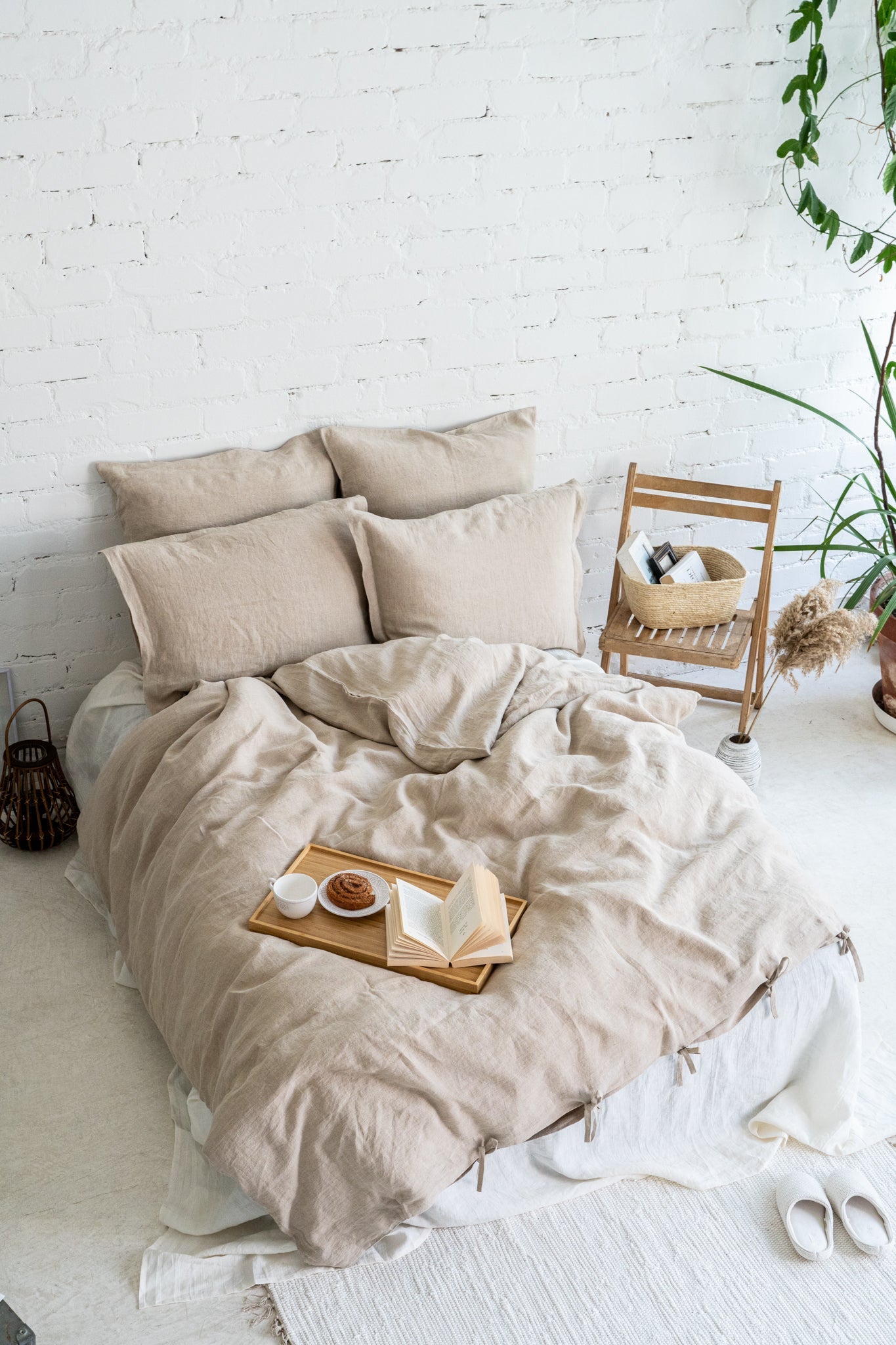 Natural linen bedding set in boho interior