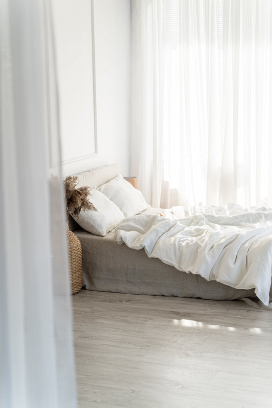 Natural linen bedding set in boho interior