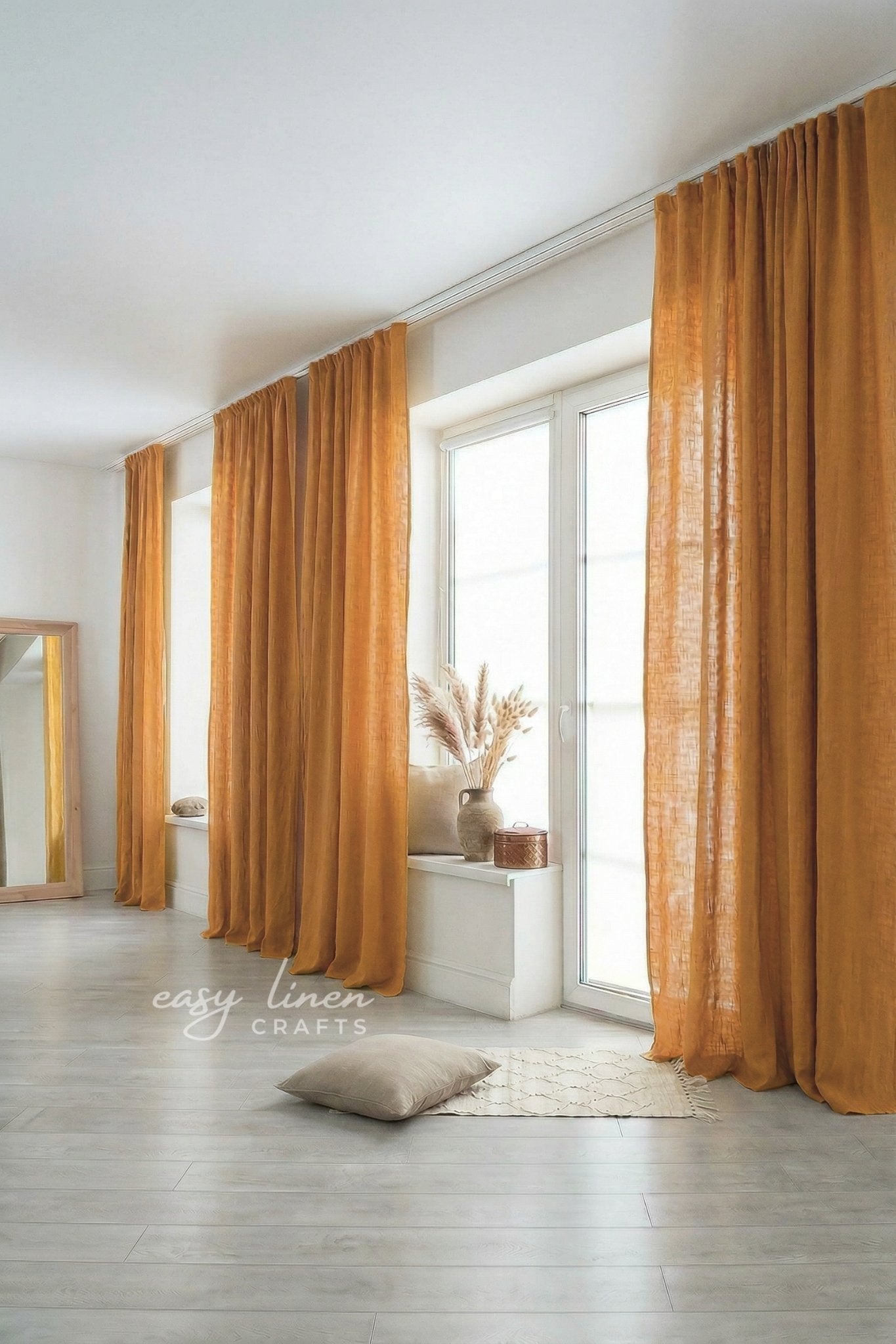 Mustard yellow curtains in a room with a mirror and decor items.