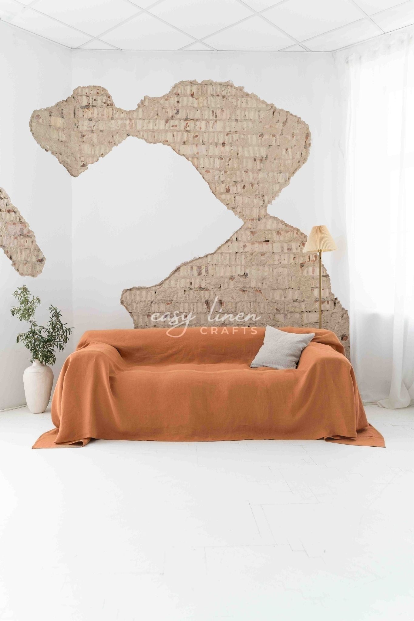Linen couch cover in Amber Orange color. Custom sizes available