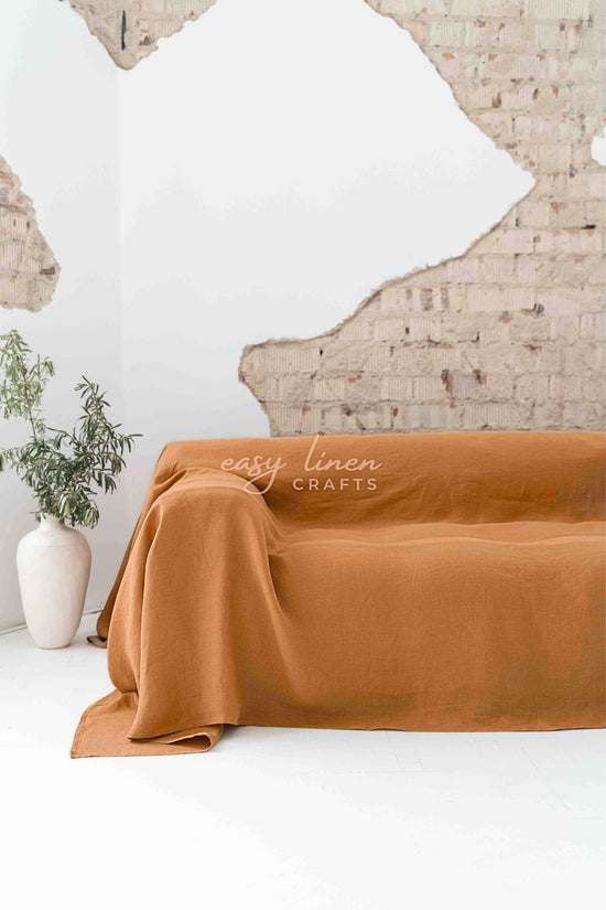 Linen couch cover in Amber Orange color. Custom sizes available