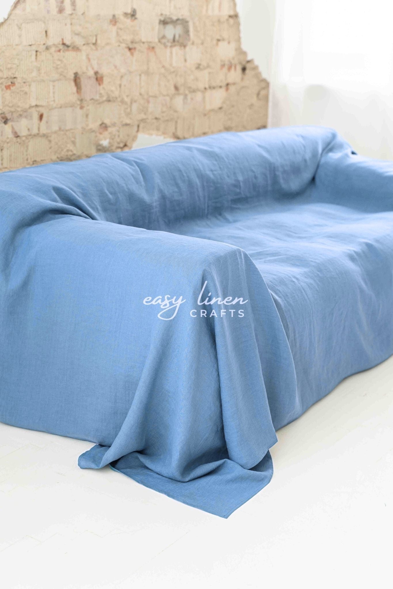 Linen couch cover in Light Blue color. Custom sizes available