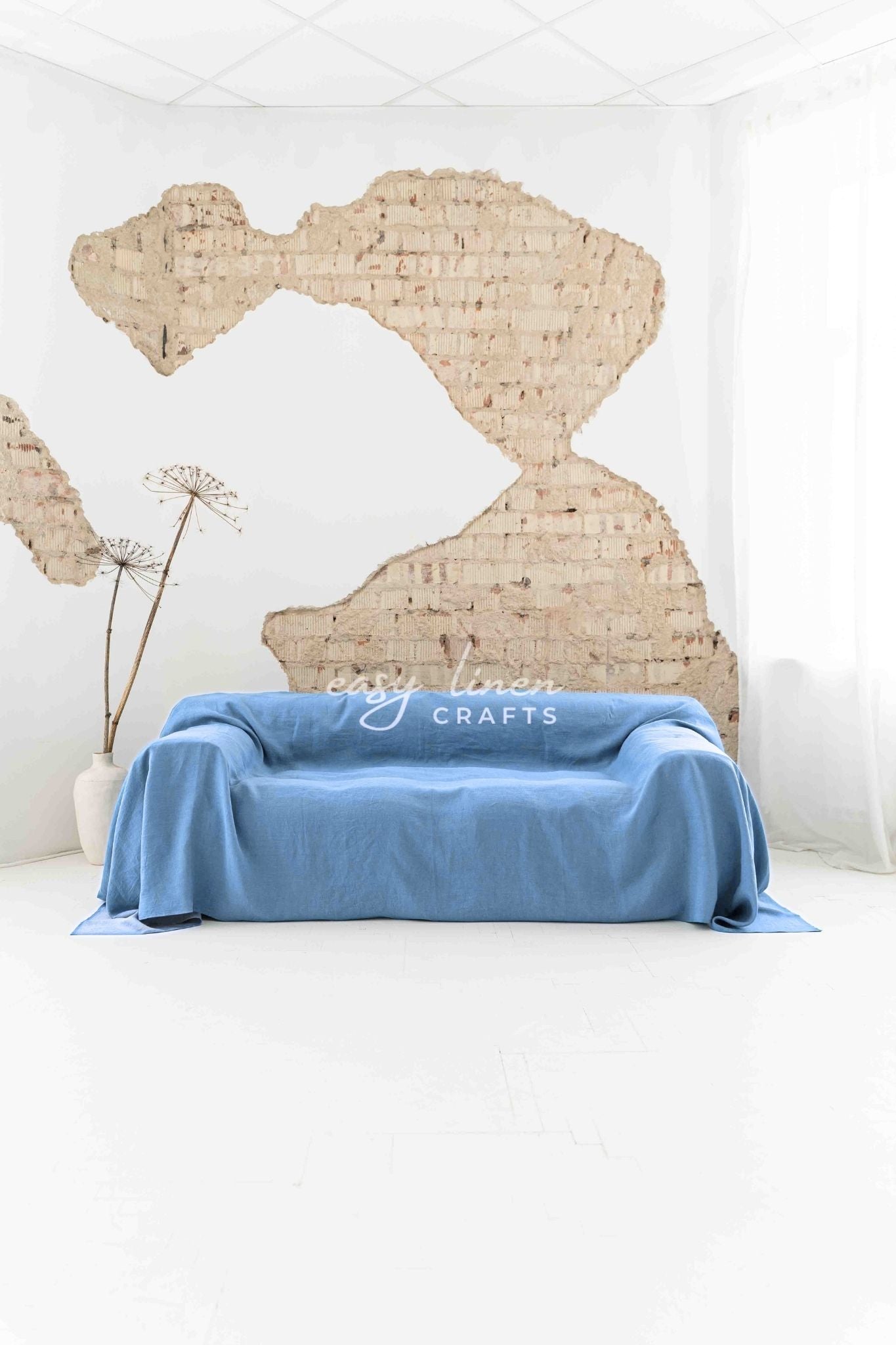 Linen couch cover in Light Blue color. Custom sizes available
