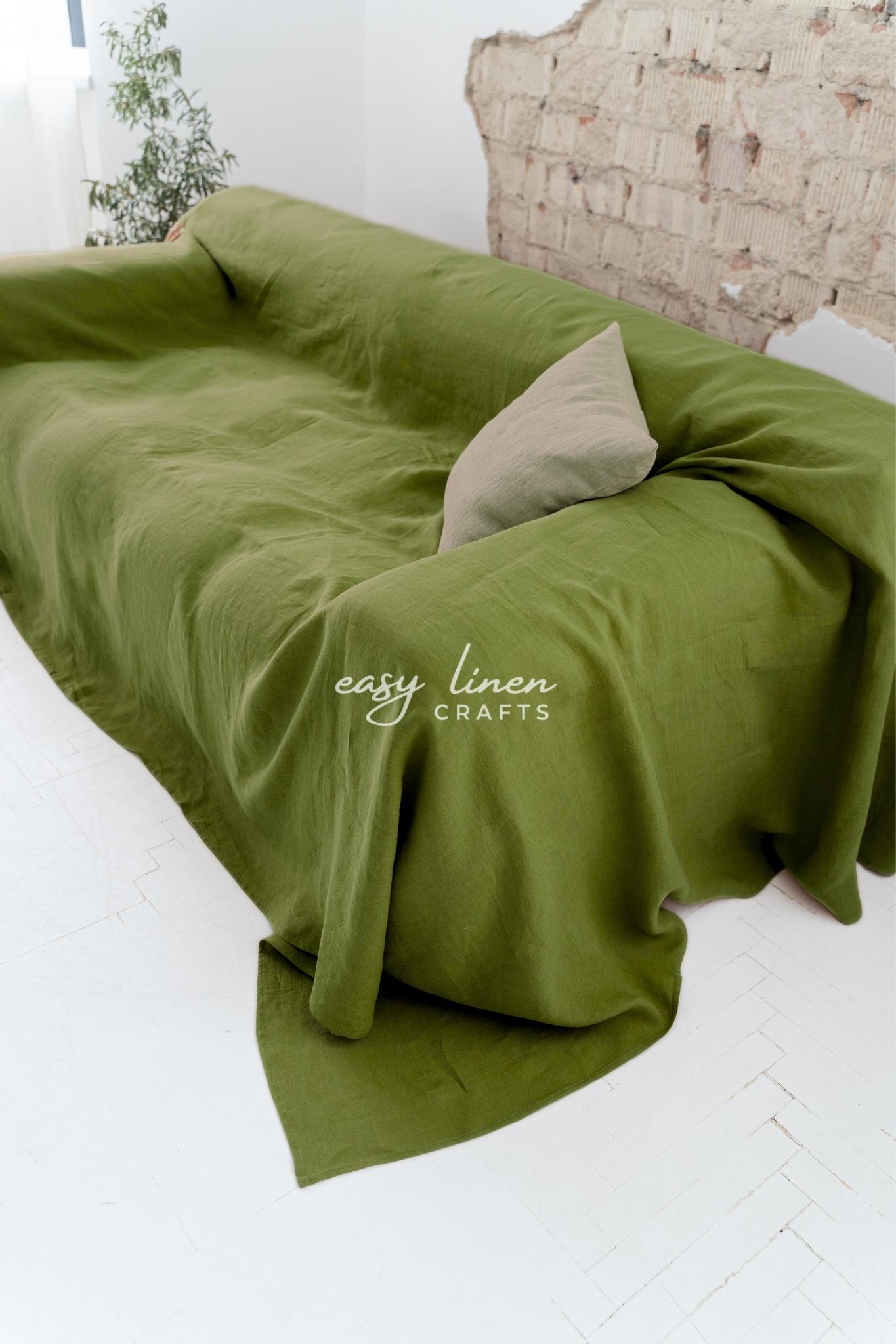 Moss Green couch slipcover on a sofa