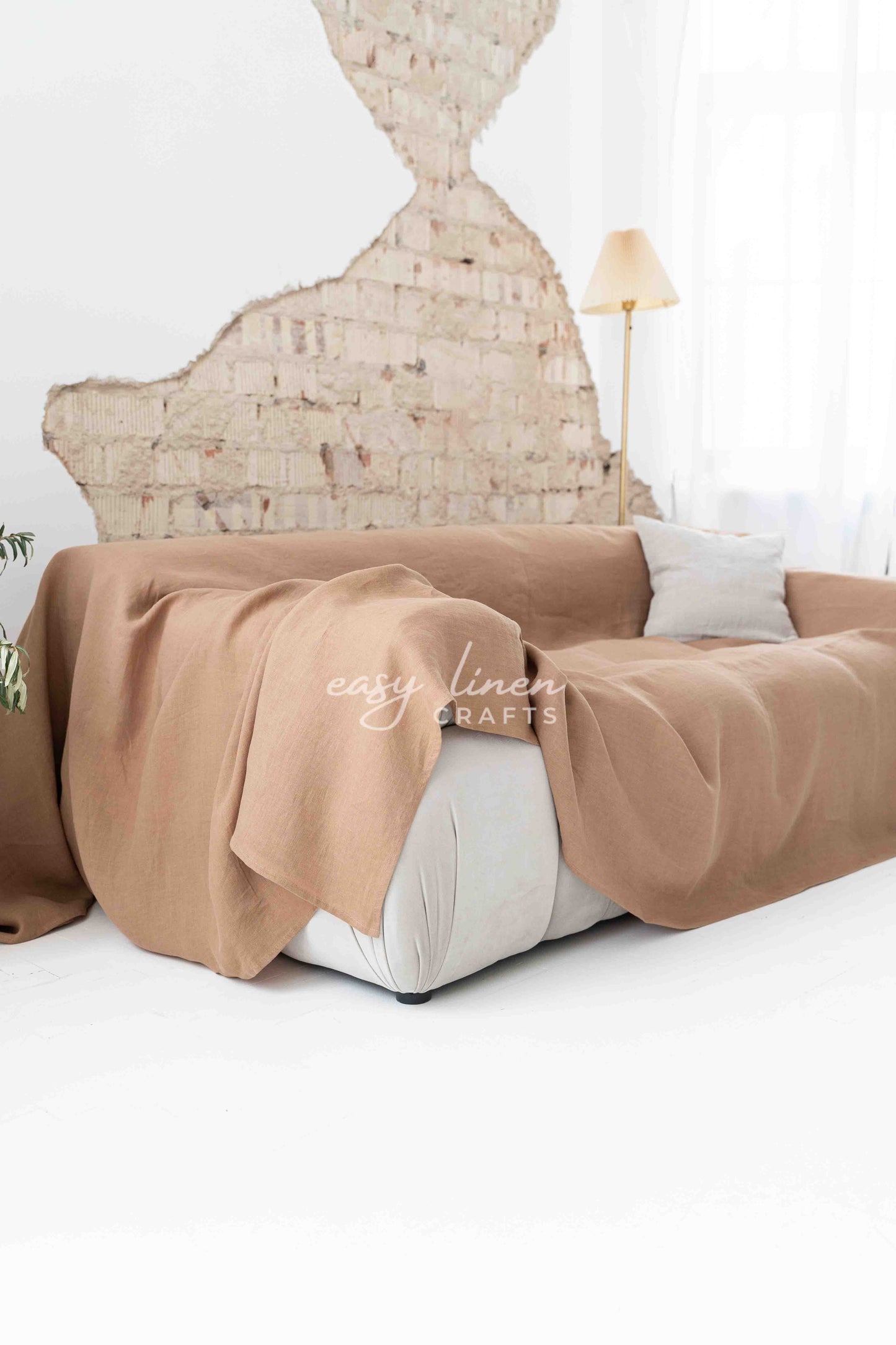 Linen couch cover in Camel Brown color. Custom sizes available