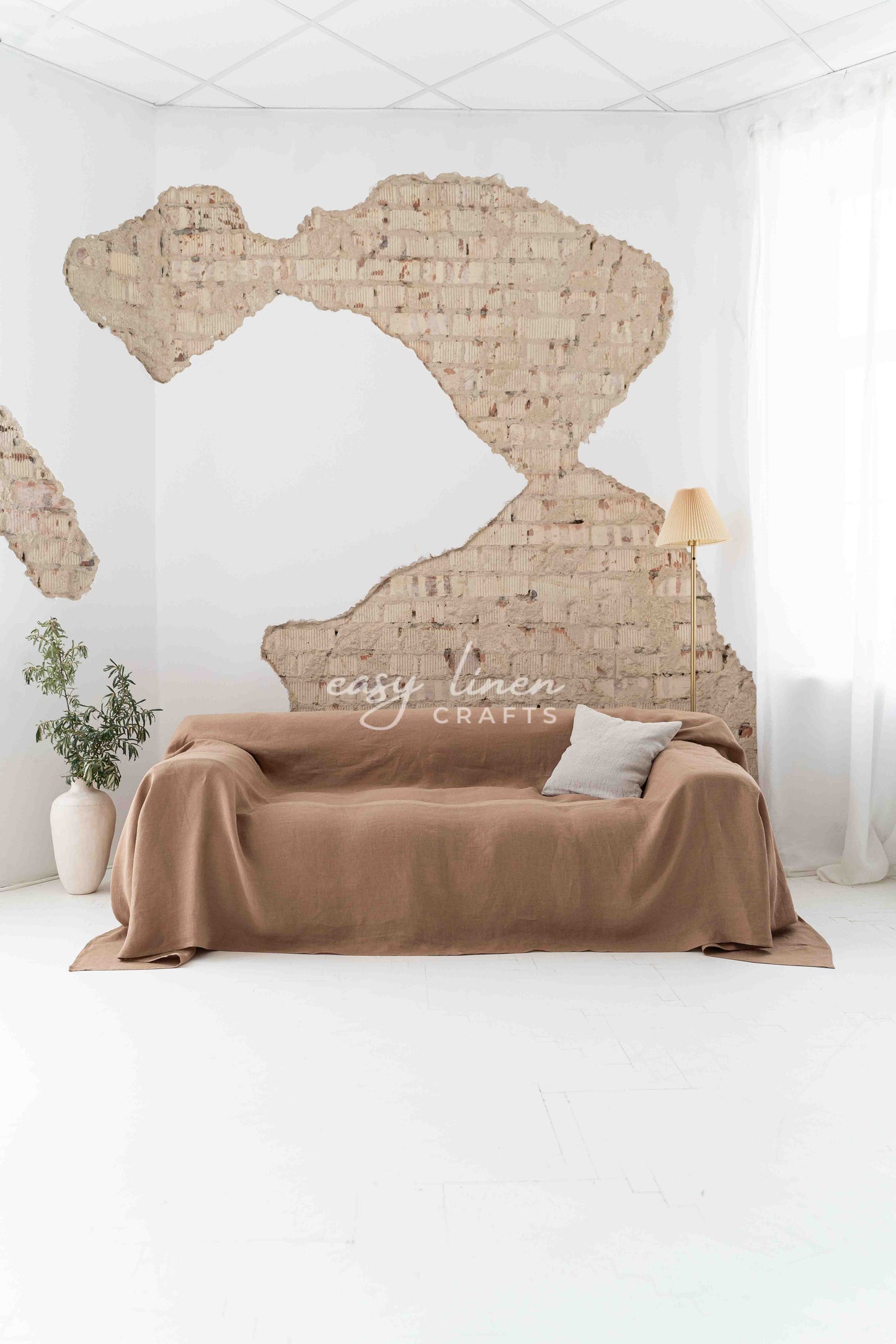 Linen couch cover in Camel Brown color. Custom sizes available