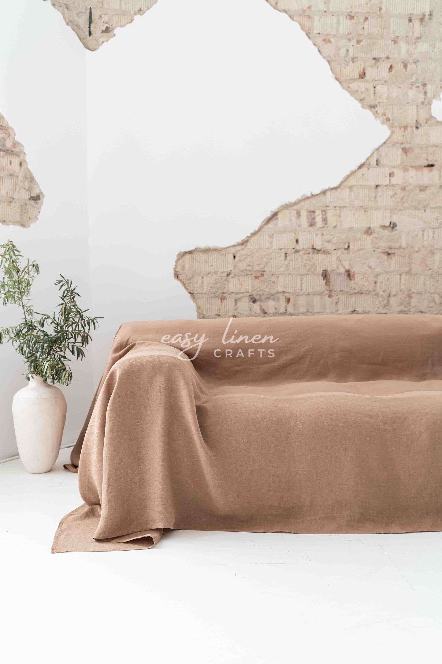 Linen couch cover in Camel Brown color. Custom sizes available
