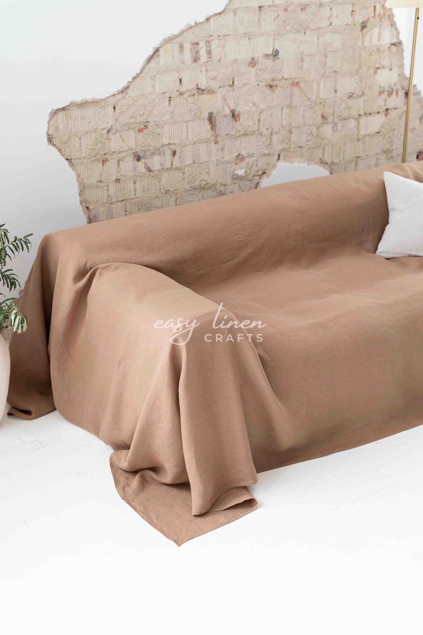 Linen couch cover in Camel Brown color. Custom sizes available