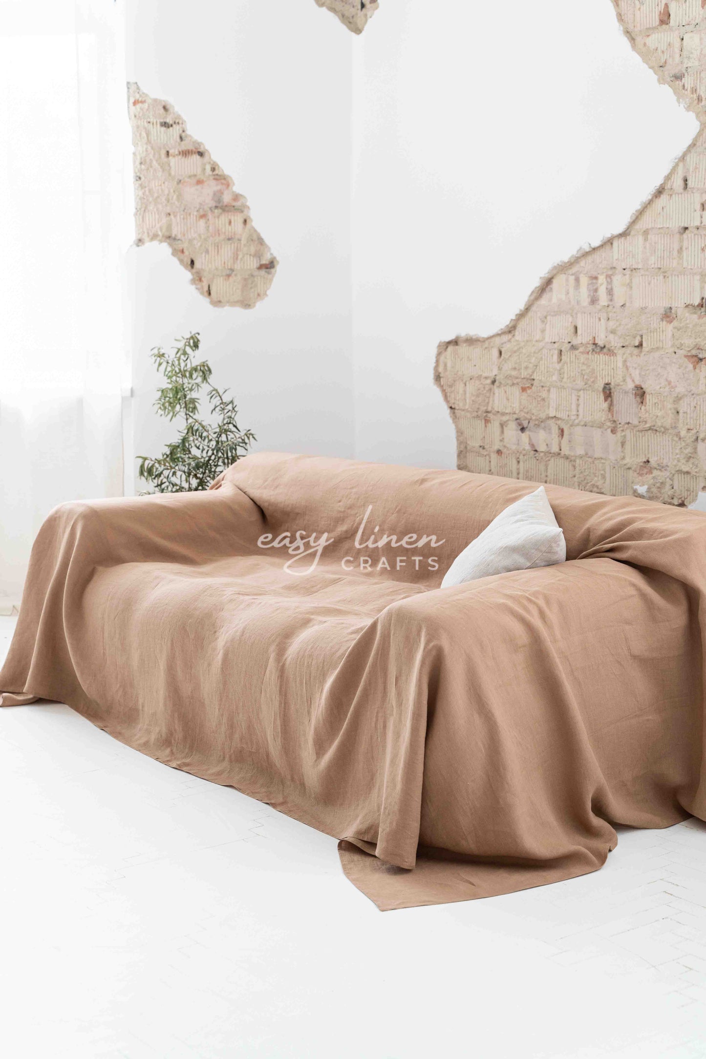 Linen couch cover in Camel Brown color. Custom sizes available