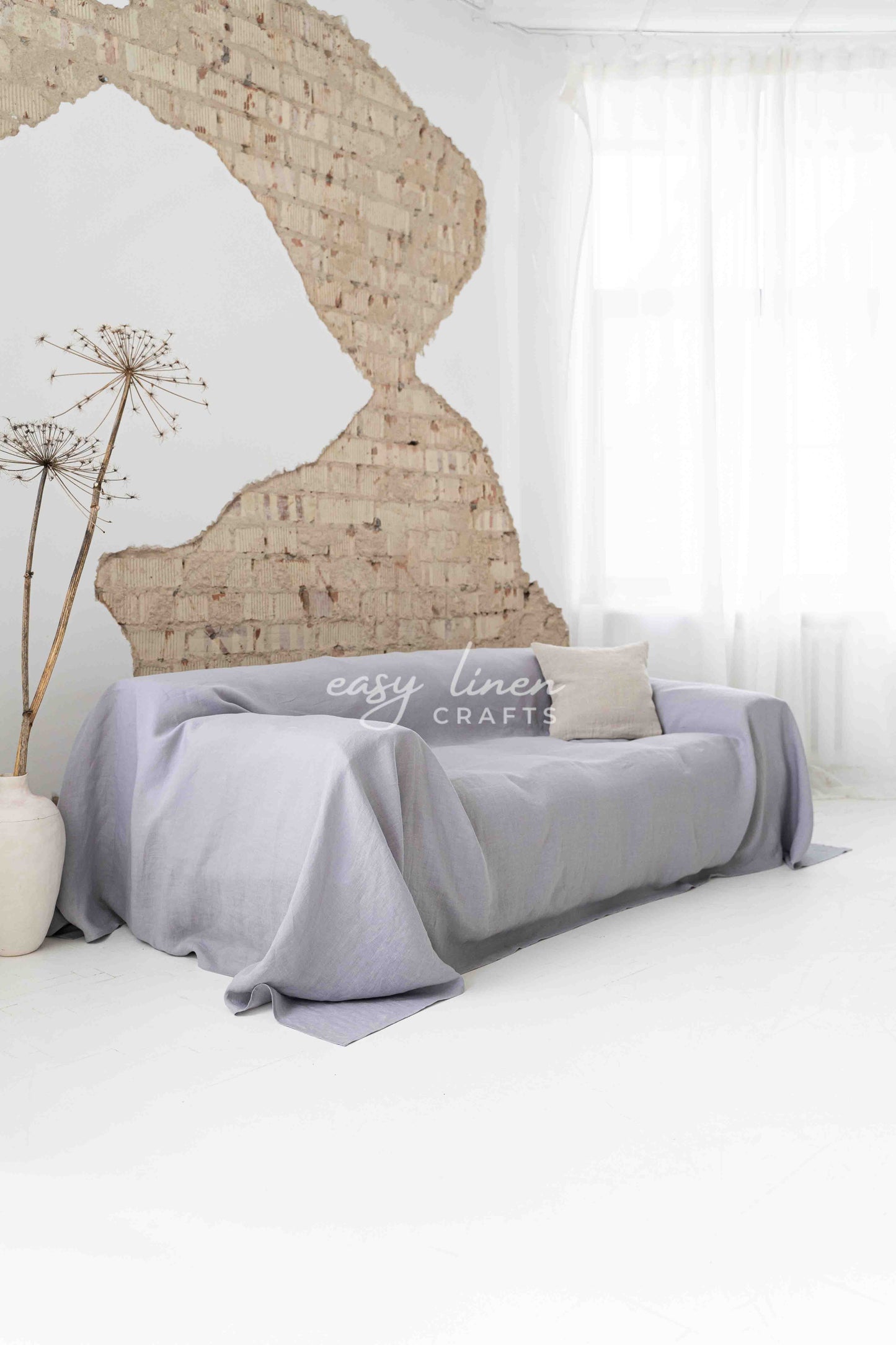 Linen couch cover in Light Gray color. Custom sizes available