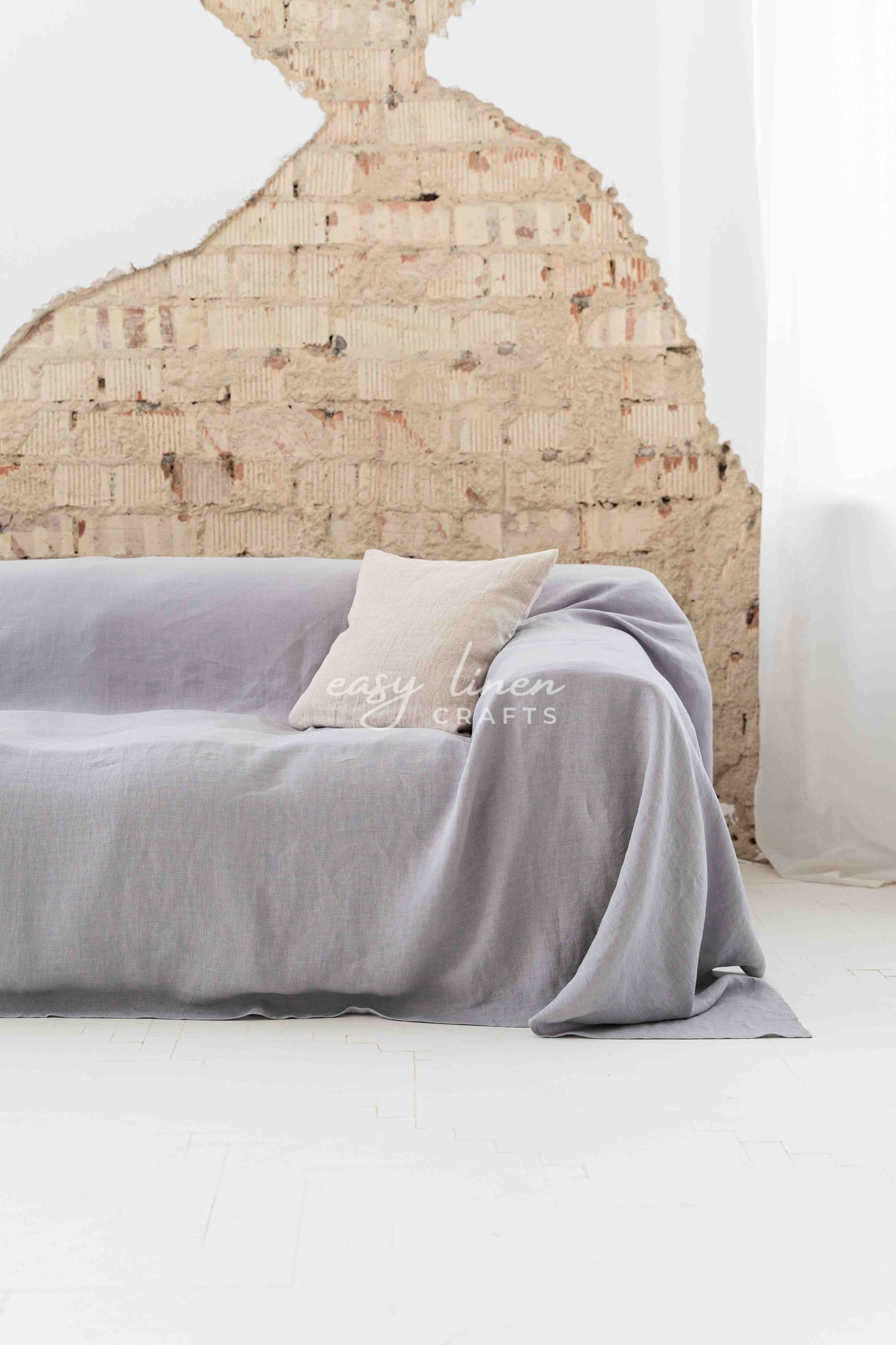 Linen couch cover in Light Gray color. Custom sizes available