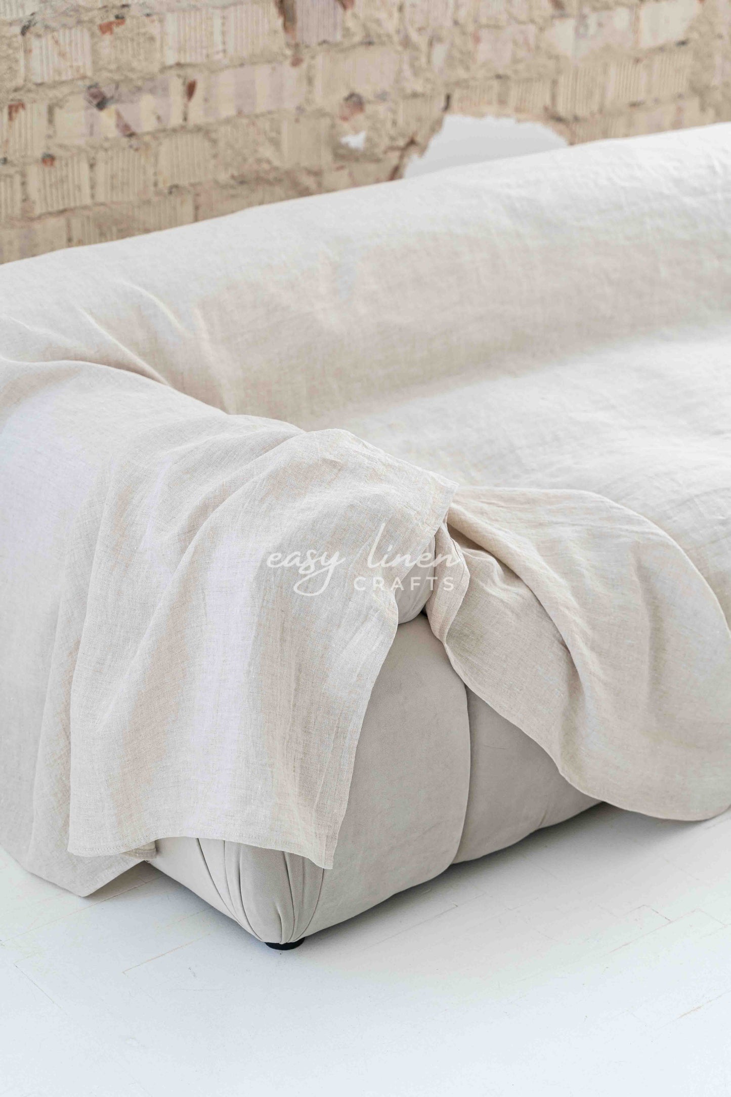 Linen couch cover in Natural Light color. Custom sizes available
