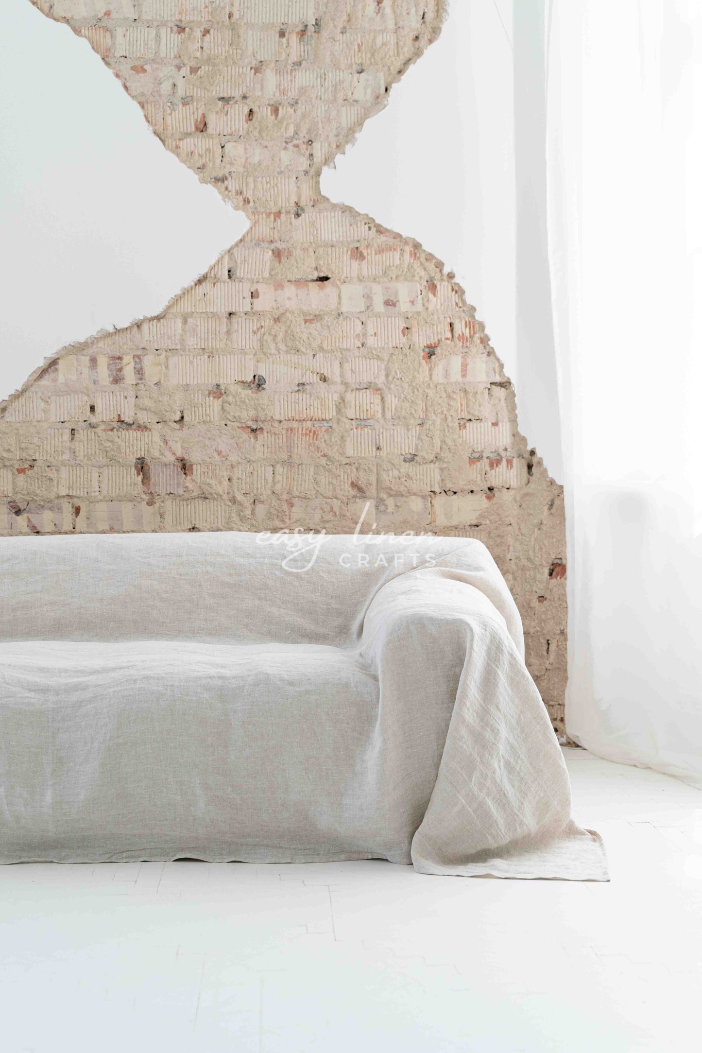 Linen couch cover in Natural Light color. Custom sizes available