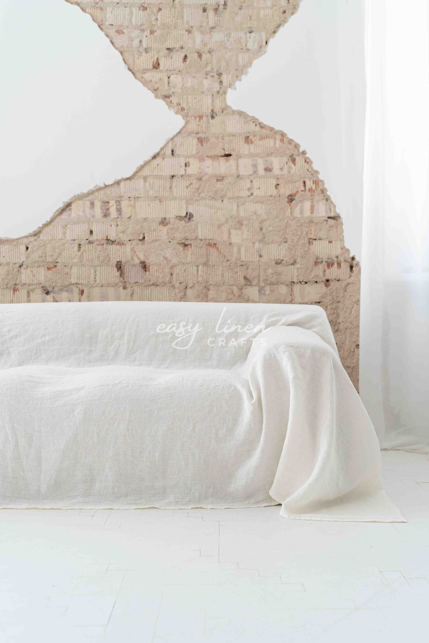 Linen couch cover in Off White color. Custom sizes available