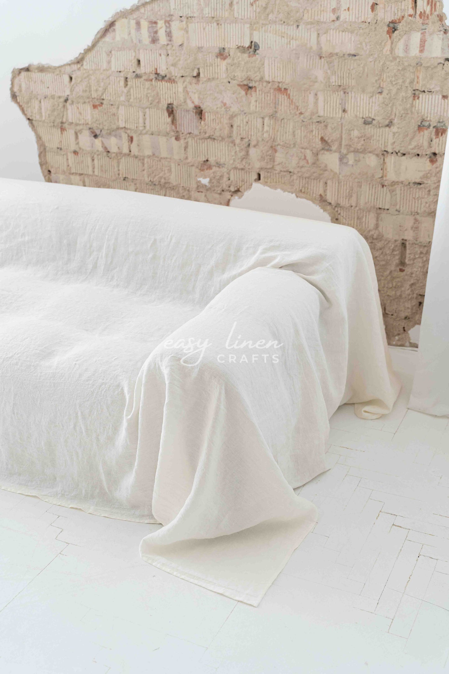Linen couch cover in Off White color. Custom sizes available