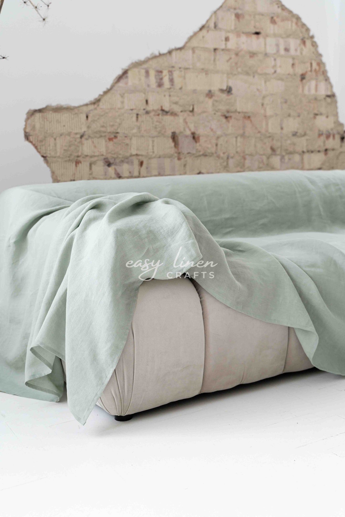 Linen couch cover in Sage Green color. Custom sizes available
