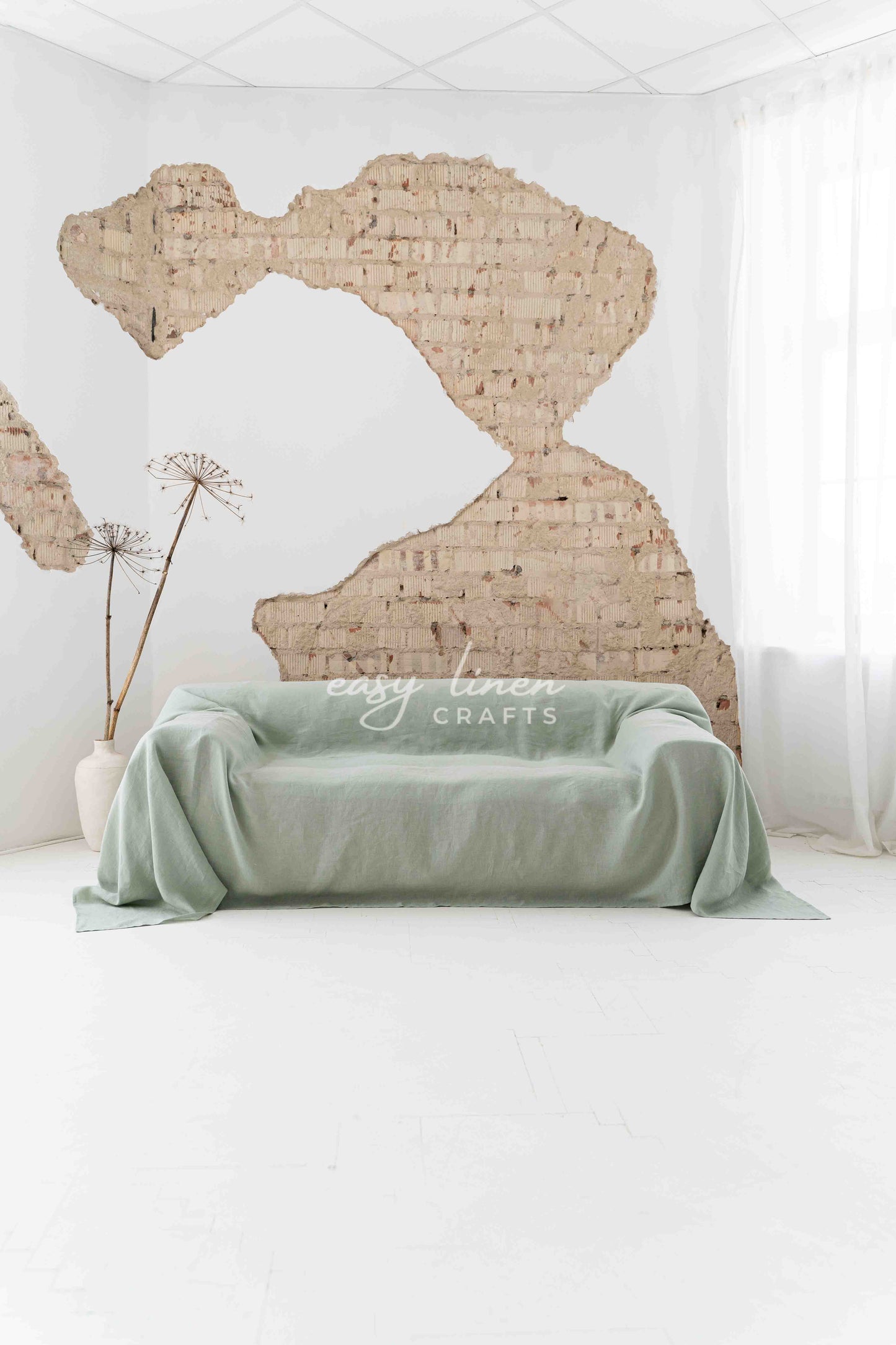 Linen couch cover in Sage Green color. Custom sizes available