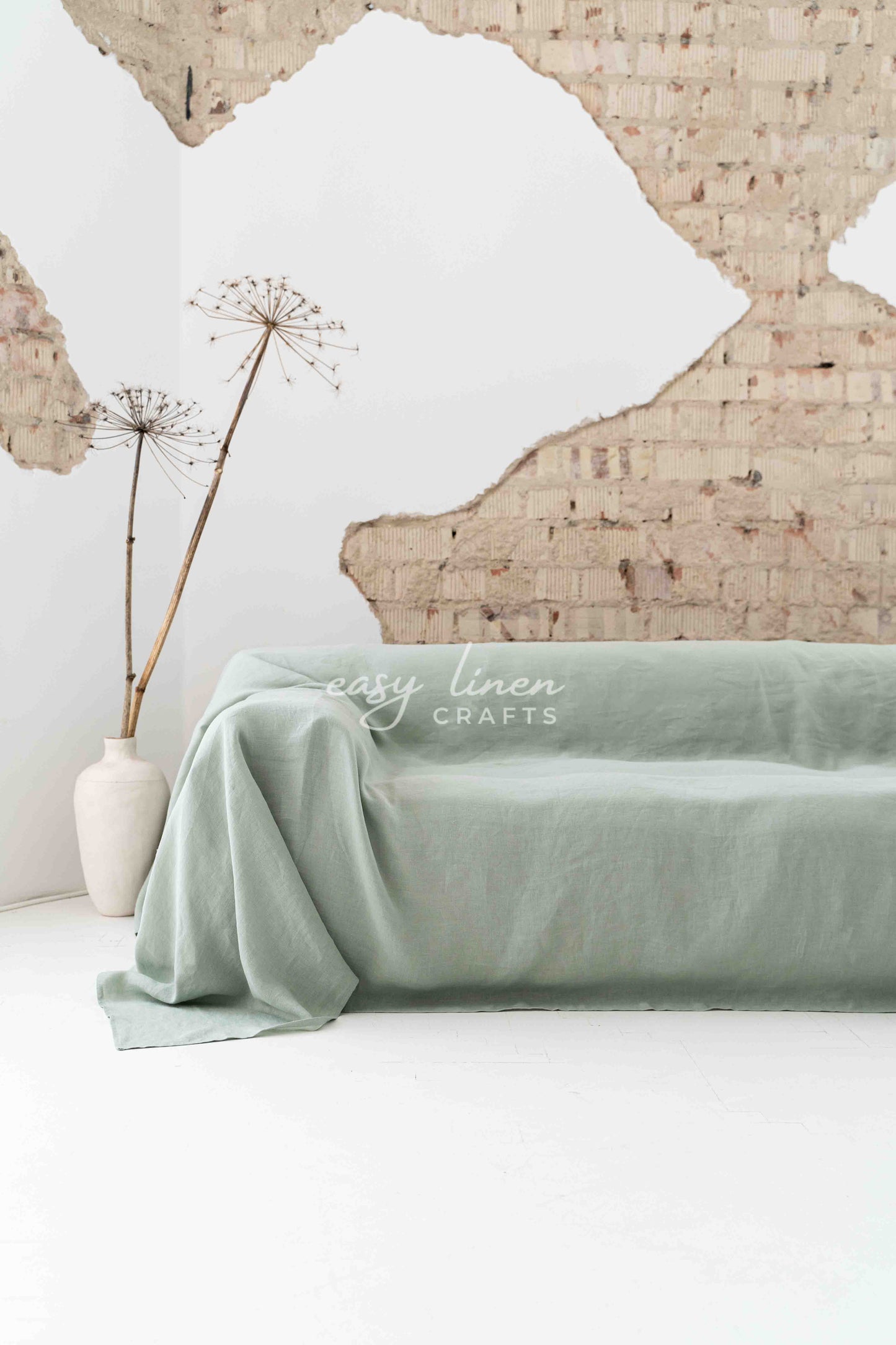 Linen couch cover in Sage Green color. Custom sizes available