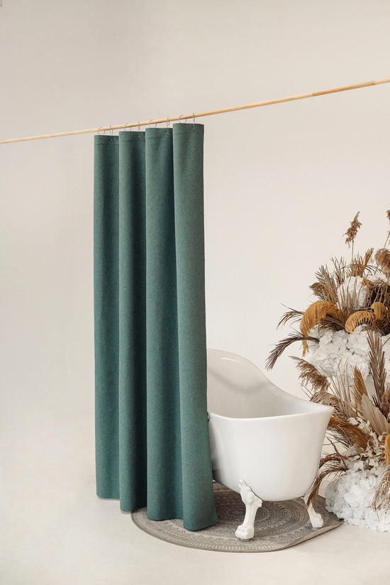 Green waterproof shower curtain with buttonholes for hooks