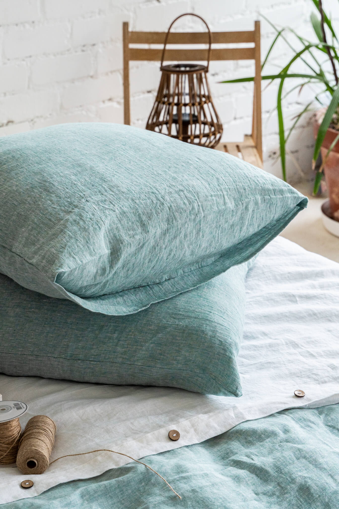Linen pillow cover with envelope closure in Melange Green color