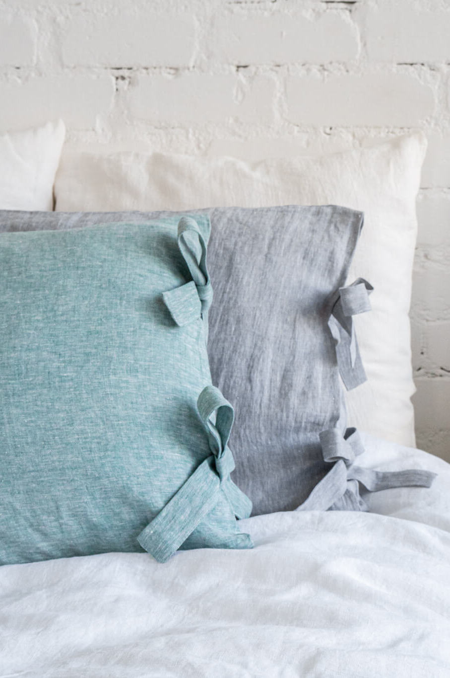 Linen pillow cover with ribbon ties in various colors