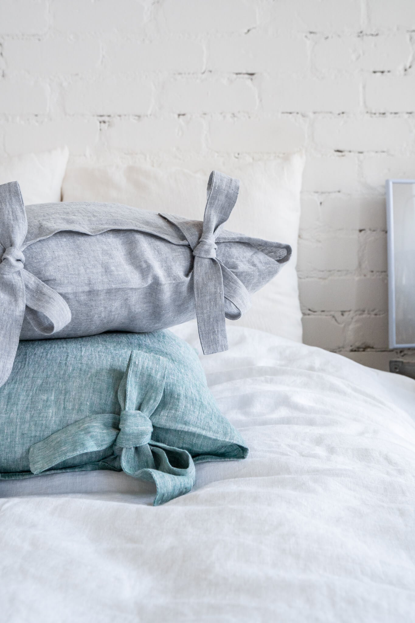 Linen pillow cover with ribbon ties in various colors