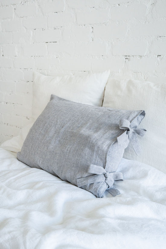 Linen pillow cover with ribbon ties in various colors